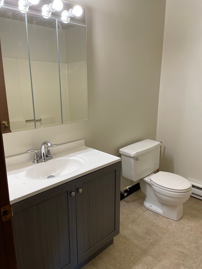 Newer vanity and lights - 815 16th Plz