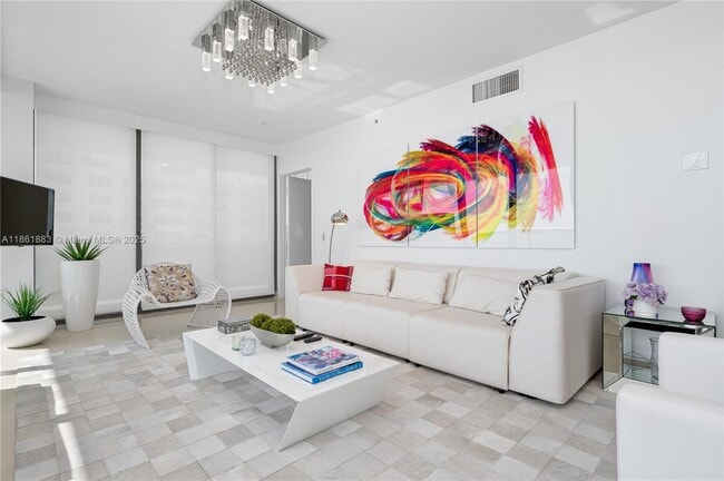 Building Photo - 5875 Collins Ave