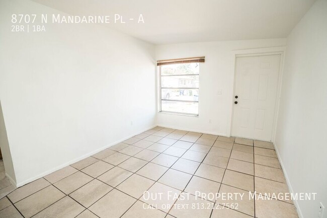 Building Photo - 8707 N Mandarine Pl