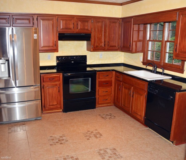 Foto del edificio - 8973 Carroll Manor Dr