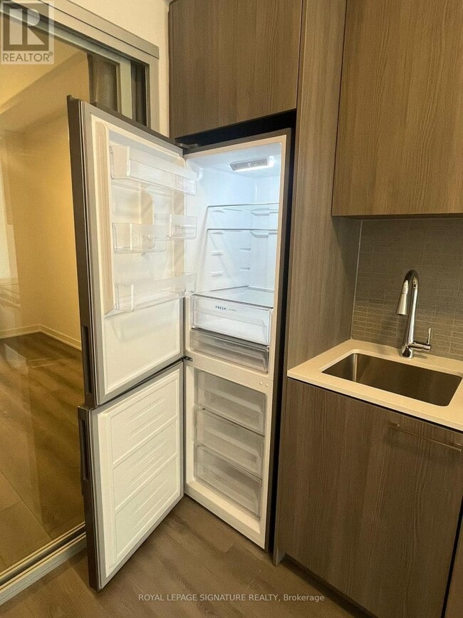 Building Photo - 7437 Kingston Rd