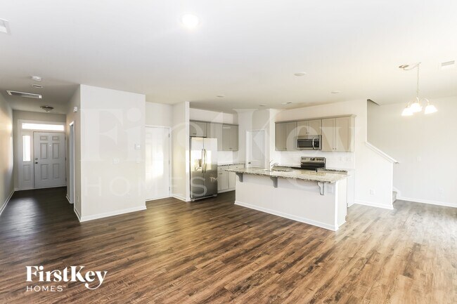 Foto del edificio - 10717 Rivergate Dr NW