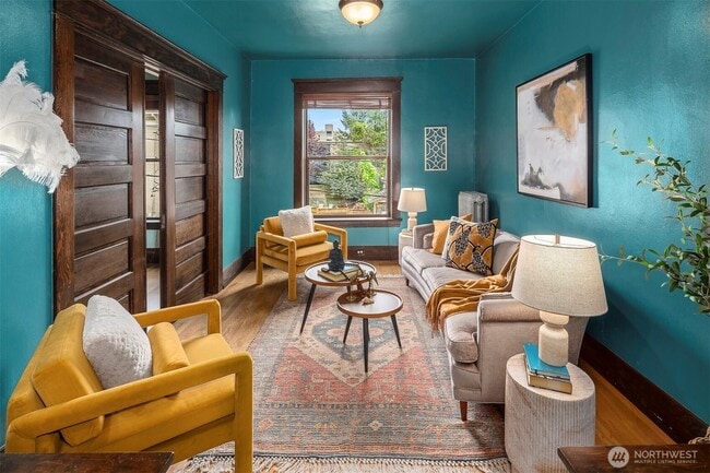 Living Room with Pocket Doors - 416 E Roy St