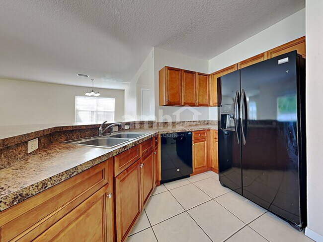 Foto del edificio - 3403 Berry Blossom Ln