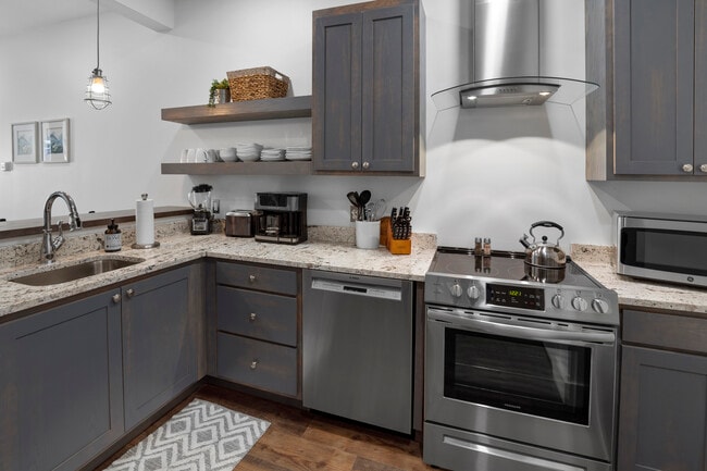 Kitchen with dishwasher - 133 W Main St
