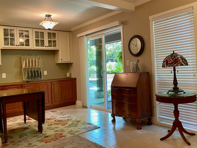 Dining Space w/ Buffet & Cabinets - 832 100th Ave NE