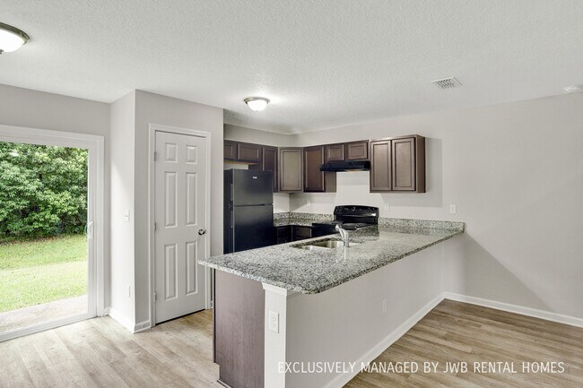 Foto del edificio - 6815 Lake Mist Ln
