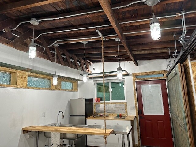 Looking towards the front door and kitchen. - 24604 University Ave