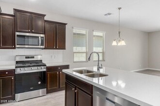 Building Photo - 8419 W Encinas Ln
