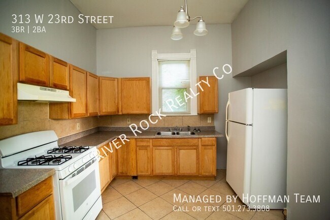 Foto del edificio - 313 W 23rd St