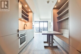 Building Photo - 55 Charles St E