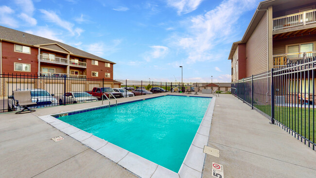 Outdoor Pool - Sunset Villas Apartments