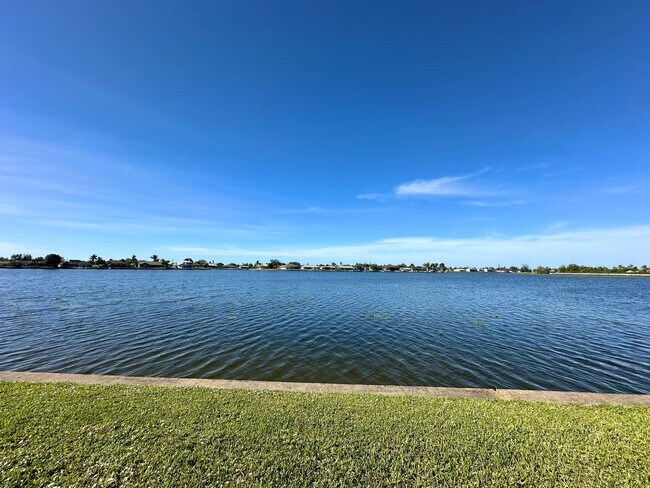 Building Photo - Beautiful Waterfront 3 Bed 2 Bath Home With Heated Pool, Washer/Dryer In Unit & More!