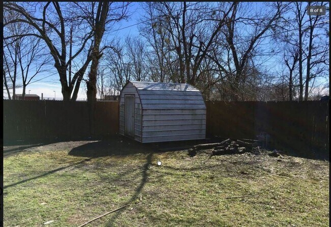Storage shed in the backyard. - 1008 S Murray St