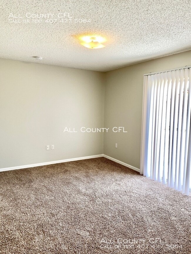 Building Photo - Cozy and Quaint Kissimmee Duplex Home!