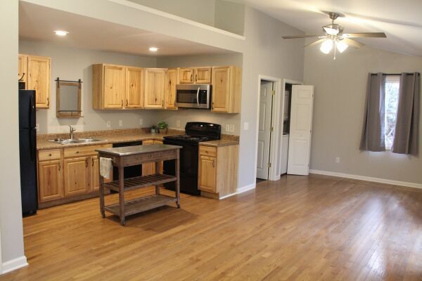Kitchen with rolling island - 328 Cloudrise Ln