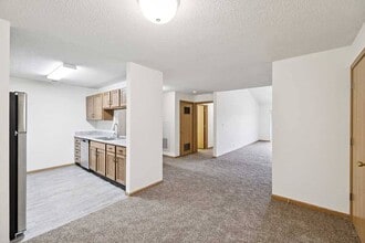 Our open-concept layouts make entertaining effortless, blending kitchen and living spaces for a warm, inviting atmosphere. - Northbrook Apartments