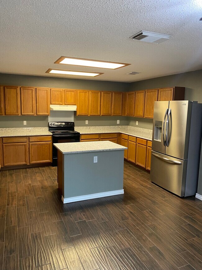 Building Photo - 18014 Redriver Song
