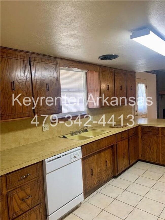 Building Photo - Charming Home with Open Kitchen, Fireplace & 2-Car Garage