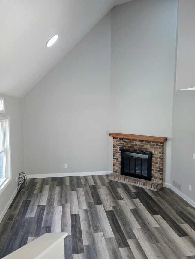 Living Room w/ Fireplace - 604 3rd Ave SE