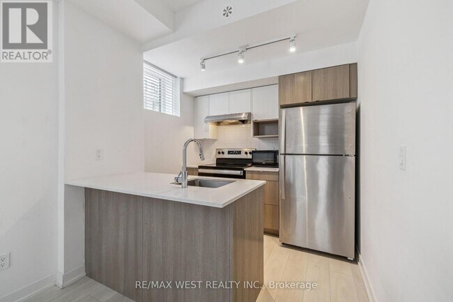Photo du bâtiment - 817-1133 COOKE Blvd