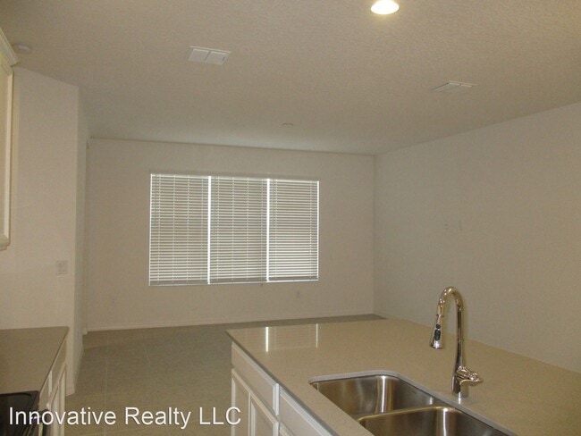 Building Photo - 3 br, 2.5 bath House - 7736 Bowery Drive