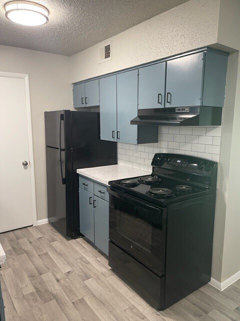 Cocina - The Village Apartments