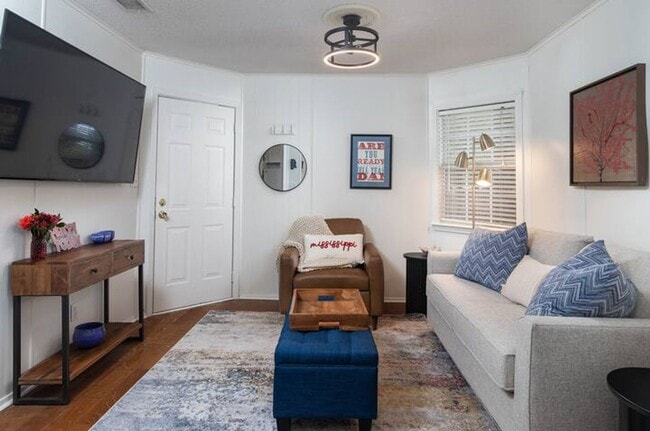 Building Photo - Fully Furnished 1-Bedroom Condo – Steps fr...