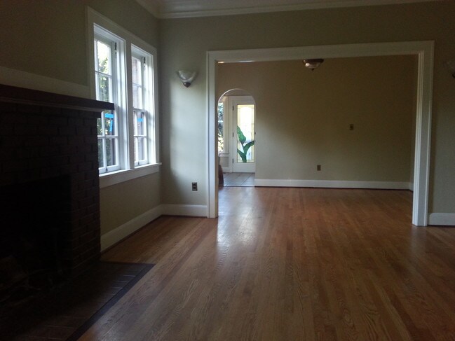Living room, dining area and rear entry - 225 NW 28th St