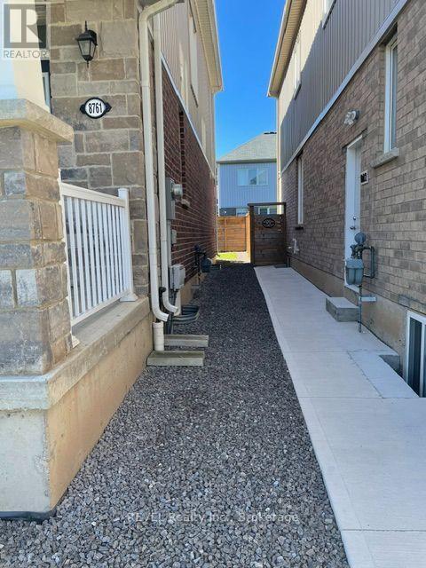 Photo du bâtiment - 8761 Sourgum Ave