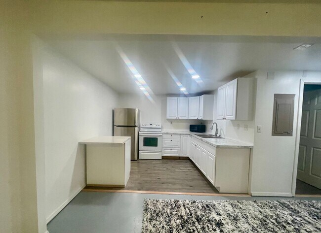 Building Photo - On an acre in Palmer! 4 bedrooms/3 bathrooms Oversized 2car garage PLUS additional shop! Addition...