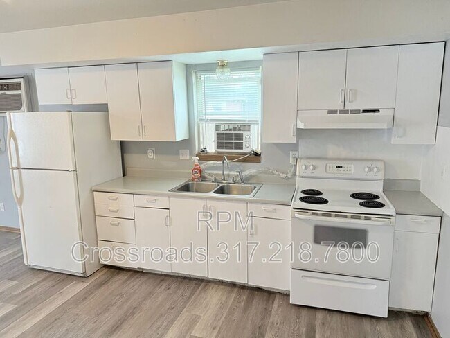 Foto del edificio - 6259 E 11th St
