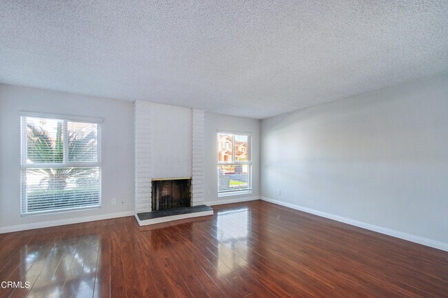 Building Photo - 703 N Stoneman Ave