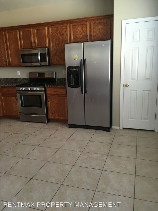 Building Photo - 4 br, 2.5 bath House - 607 MARLBERRY PL