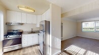 Located at 3309 Cowley Way in the Clairemont neighborhood of San Diego, California, this single-floor residence offers a well-organized and functional layout with clean, neutral finishes throughout. The kitchen is thoughtfully updated, showcasing white shaker-style cabinetry, granite countertops, a stainless steel undermount sink with a brushed nickel faucet, a stainless steel gas range with an overhead exhaust hood, and a stainless steel refrigerator. Wood-look flooring in the kitchen adds warmth and durability to the space. The living area is generously sized, featuring plush carpeting, a large picture window dressed with vertical blinds that invites an abundance of natural light and offers views of the surrounding greenery. A wall-mounted HVAC unit provides climate control throughout. The bedroom is carpeted and features mirrored sliding closet doors, enhancing the sense of space and offering ample storage. The bathroom is clean and functional, with a white basin sink, brushed nickel fixtures, and a mirrored medicine cabinet. Soft, neutral tones are carried consistently throughout the home, creating a cohesive and inviting atmosphere. This residence combines practical updates with a comfortable, move-in-ready appeal in a convenient San Diego location.