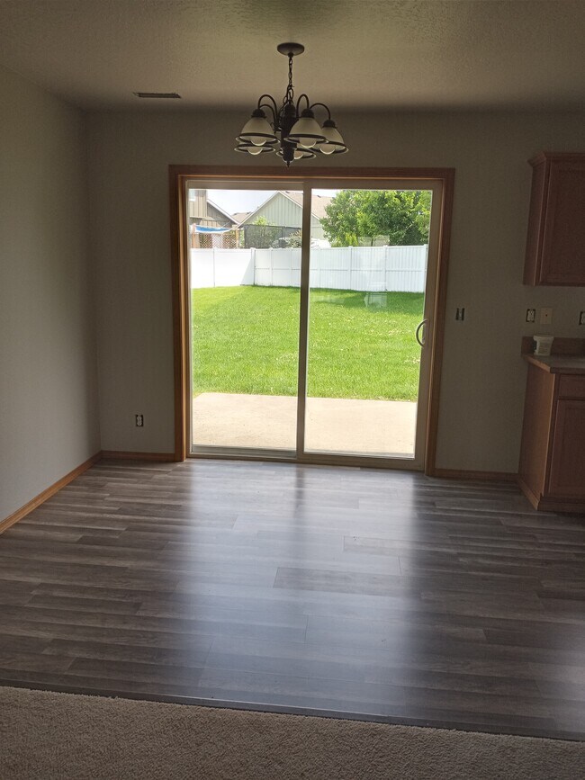 Dining area with sliding door to patio - 6300 W Trestle St