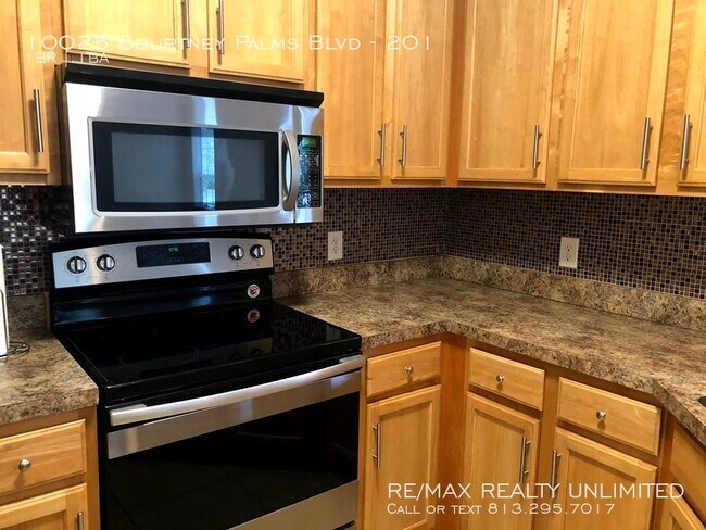 Foto del edificio - 10025 Courtney Palms Blvd #201 Tampa, FL 3...