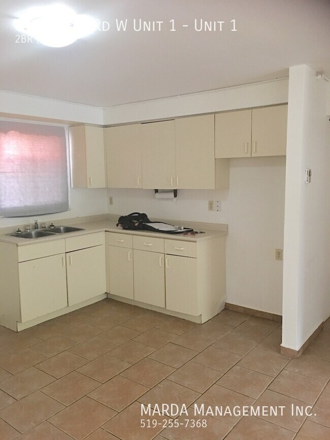 Photo du bâtiment - COZY 2 BED/1 BATH APT IN WHEATLEY + HYDRO & WATER