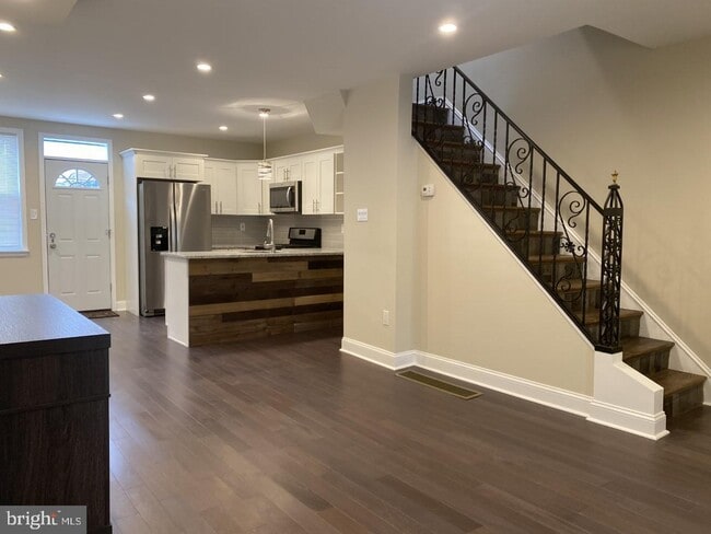 Living room and kitchen view - 7207 Buist Ave