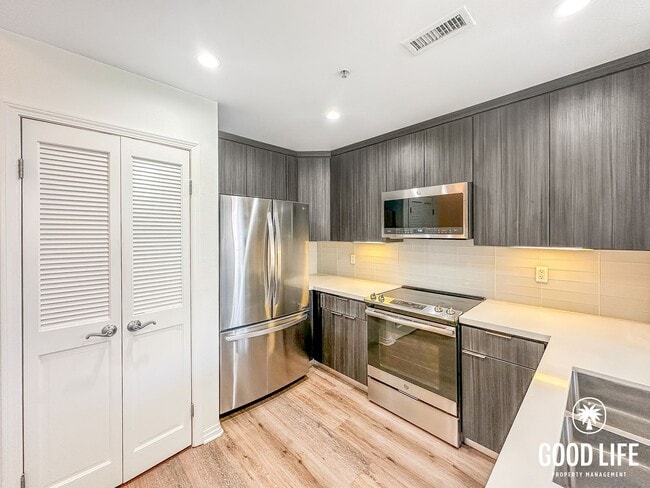 Building Photo - Luminous 3BD/2BA Corner Unit in Little Italy with City Views, W/D & Private Balcony