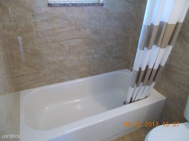 Building Photo - 1 br, 1 bath Condo - 4420 SPRINGER AVE