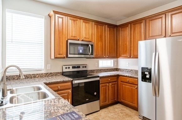 Building Photo - GET 1ST FULL MONTH'S RENT FREE! - 10125 E ...