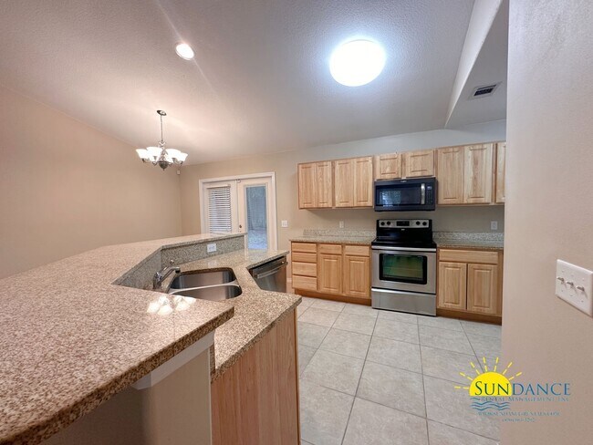 Foto del edificio - Gorgeous 3-Bedroom Home in Tranquil Navarre Neighborhood!
