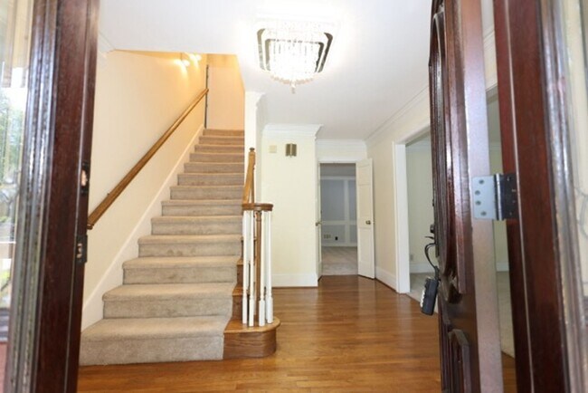 Building Photo - Stunning Fully Renovated 3-Story Home with In-Law Suite – Perfect for Multigenerational Living in...