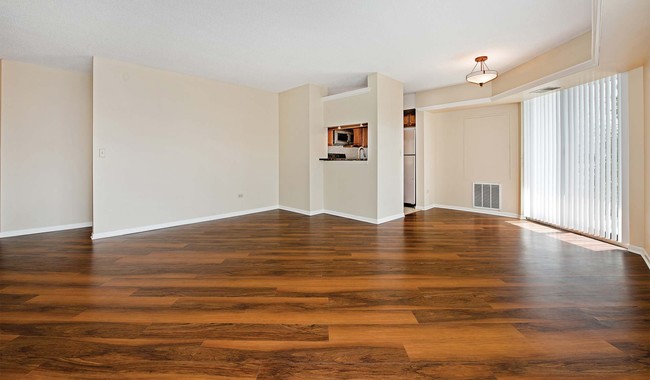 Enjoy spacious floorplans and wood flooring throughout - Elm Creek Apartments