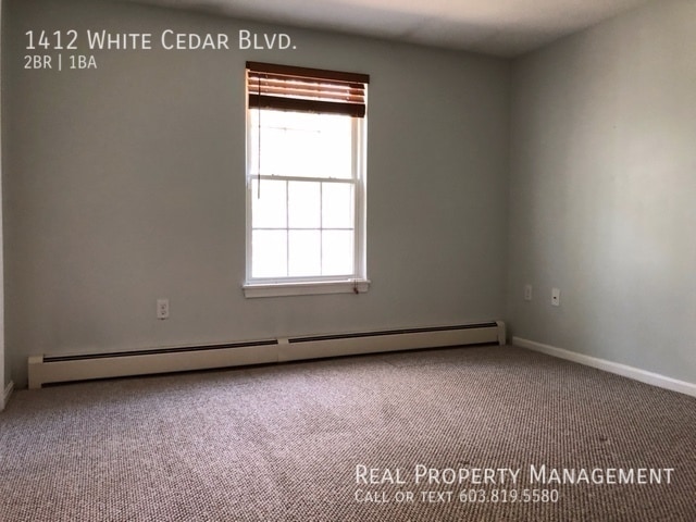 Building Photo - Spacious 2 Bedroom Apartment located at Th...