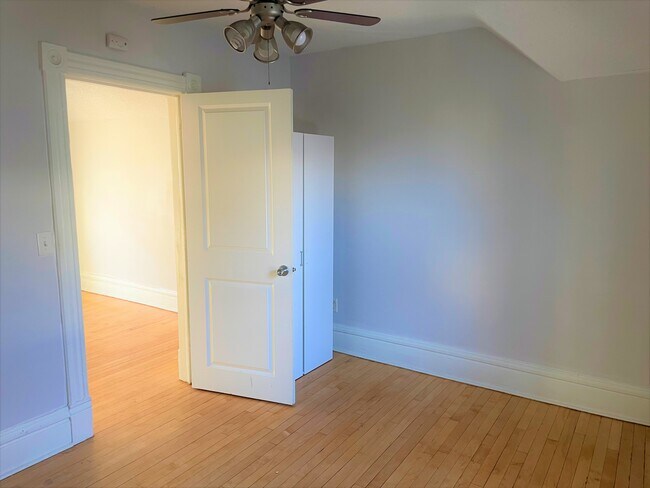 Bedroom 2 with armoire - 610 Jessamine Ave E