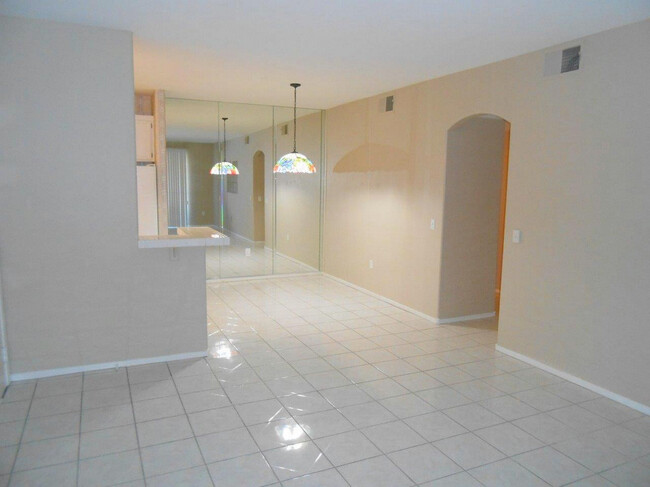 Building Photo - Spacious 3 bedroom Condo w/Garage and Gate...