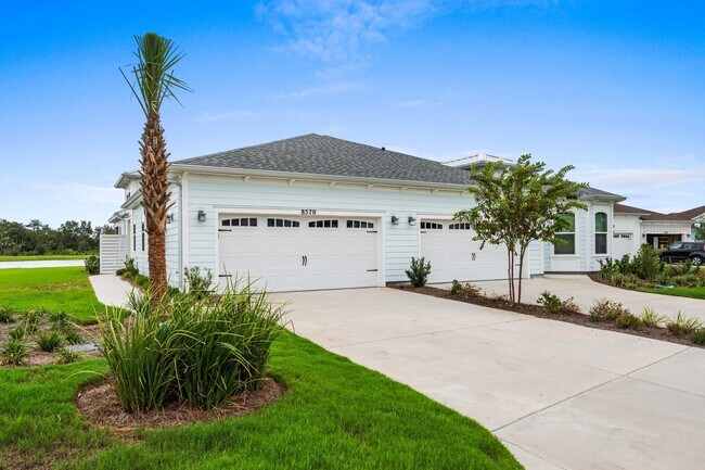 Foto del edificio - 8570 Island Breeze Ave