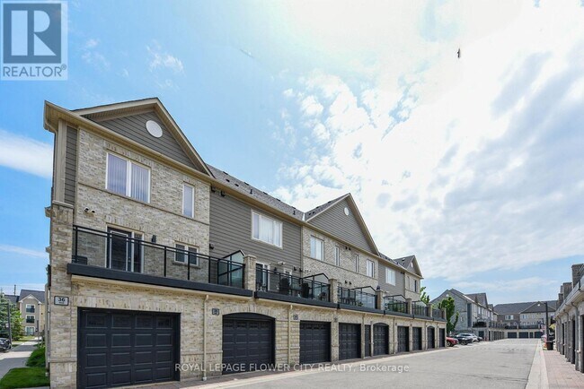 Photo du bâtiment - 5035-5035 Oscar Peterson Blvd